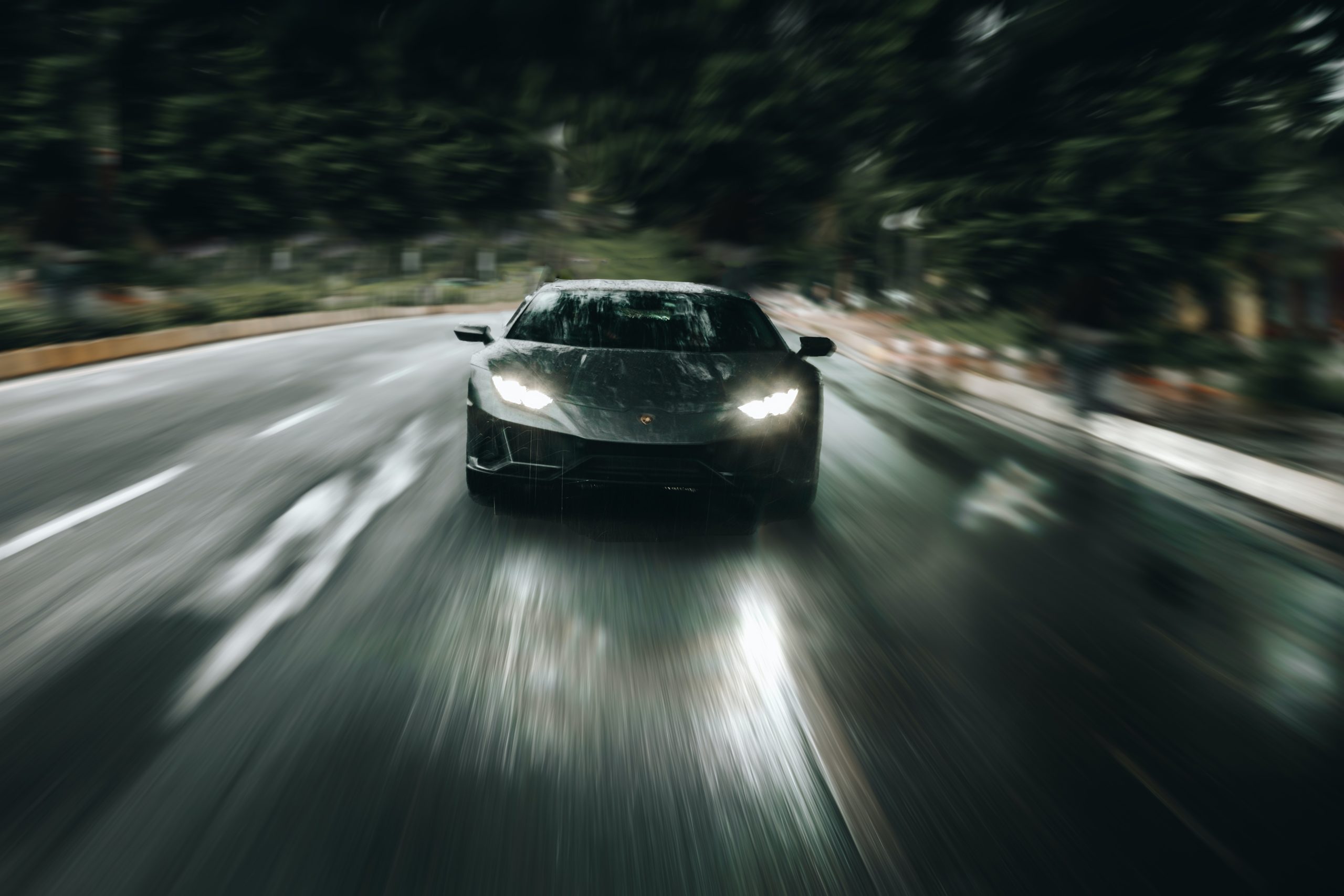 car speeding in the rain