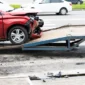 Car loaded onto tow truck